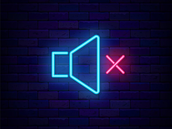 Blue neon loudspeaker with a pink cross next to it